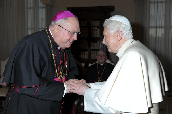 Pope Benedict XVI greets Bishop Robert C. Morlino of Madison, Wis., during a Feb. 10 meeting with U.S. bishops from Wisconsin on their "ad limina" visits to the Vatican. (CNS/L'Osservatore Romano)