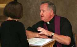New York priest hears confession (CNS photo)