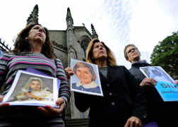 Members of Survivors Network of those Abused by Priests -- Therese Albrecht, Barbara Blaine and Barbara Dorris -- protest outside St. Mary's Catholic Cathedral in Edinburgh, Scotland Sept. 15, 2010. (CNS/Dylan Martinez, Reuters)