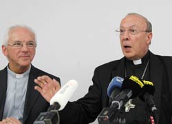 Archbishop Andre-Joseph Leonard of Mechelen-Brussels speaks at a press conference introducing Bishop Jozef De Kesel, left, as the newly-named bishop of Brugge, Belgium, June 25 in Brussels. Bishop De Kesel, former auxiliary bishop of Mechelen-Brussels, replaces Bishop Roger Vangheluwe, who stepped down April 23 after admitting to sexually abusing a boy. (CNS photo/Francois Lenoir, Reuters)