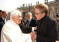 Pope Benedict XVI meets Joshua Casteel, a former U.S. Army intelligence interrogator at Abu Ghraib prison in Iraq, during a general audience March 14, 2007.Casteel was then working for the Indiana -based Catholic Peace Fellowship as a conscientious objector liaison. (CNS/L'Osservatore Romano)
