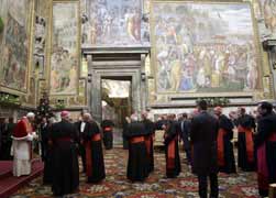Pope Benedict XVI delivers a speech Dec. 21 during his annual pre-Christmas meeting with the Roman Curia and cardinals who reside in Rome. During the meeting, the pope said the church must repent and repair the damage caused by clerical abuse. (CNS photo /L'Osservatore Romano via Reuters)