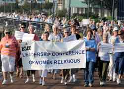 Members of the LCWR march through Woldenberg Riverside Park in New Orleans for a prayer service to preserve the wetlands, part of the LCWR's Aug. 11-14 gathering. (CNS/Frank J Methe)