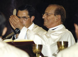 Father Marcial Maciel Degollado, right, is pictured celebrating Mass in this undated file photo. (CNS)