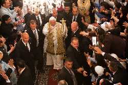Pope greeting Catholics. Easy access raises security questions (CNS photo).
