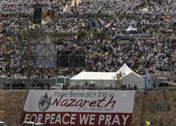 People gather for an outdoor Mass celebrated by Pope Benedict XVI on Mount Precipice in the northern Israeli city of Nazareth May 14. (CNS/Reuters)