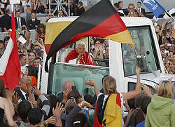 Pope Benedict XVI waves as he arrives to lead a prayer vigil in Germany in September. (CNS/Reuters/Arnd Wiegmann)