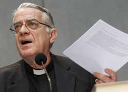 Jesuit Fr. Federico Lombardi, Vatican spokesman, presents the Vatican's revised procedures for handling cases of sexual abuse by priests during a press conference at the Vatican July 15. (CNS photo/Paul Haring)