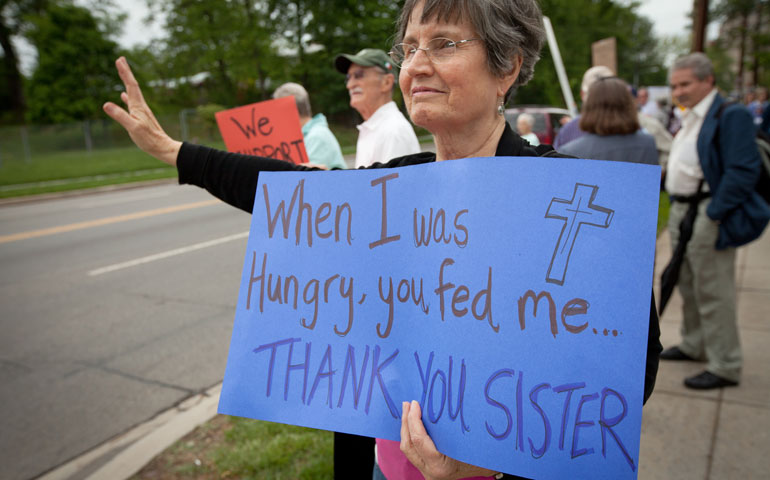 Arlene McGarrity of St. John the Baptist Church in Silver Spring, Md., demonstrates her support of women religious and the Leadership Conference of Women Religious outside the U.S. bishops’ headquarters May 8, 2012. (CNS/Nancy Phelan Wiechec)