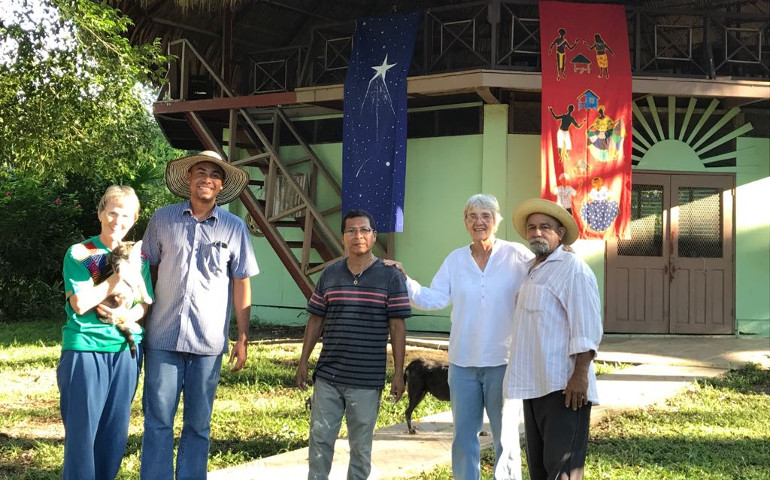 Members of the Santa Fe Pastoral Center community welcome visitors. From left, Sr. Peg "Margarita" Dillon, Horacito, Emel, Sr. Melinda Roper and Horacio. (Clara Meza)