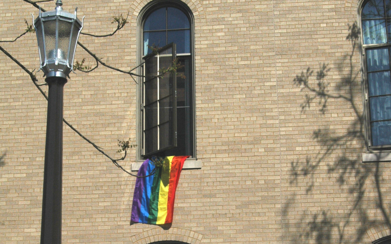 A rainbow flag hangs out of a window at St. Edwards Hall, a men's undergraduate residence hall at Notre Dame. (NCR photo/Catherine M. Odell)