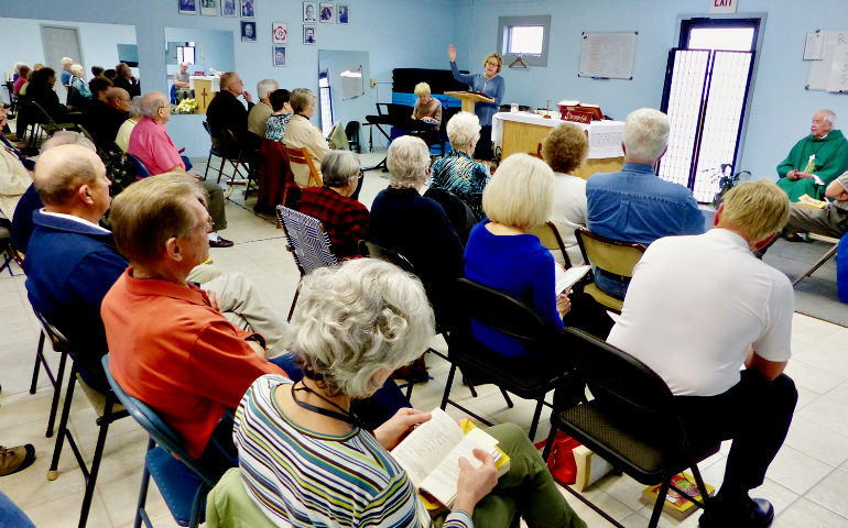 About 50 parishioners from St. John the Evangelist Church in Waynesville, N.C., are led in the responsorial psalm during Sunday Mass at a local wellness center on Jan. 14. (Courtesy of Carol Viau)