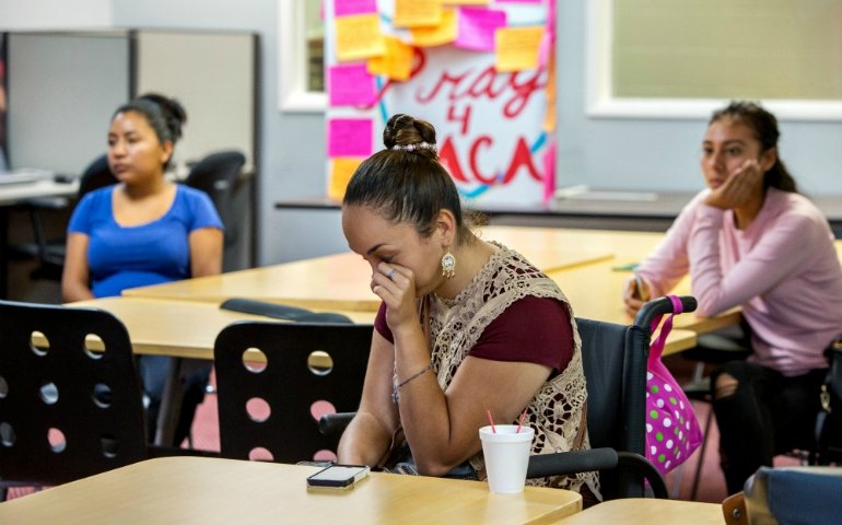 At the Coalition for Humane Immigrant Rights headquarters in Los Angeles, Paulina, 26, reacts to Attorney General Jeff Sessions' Sept. 5 announcement that the Deferred Action for Childhood Arrivals program is "being rescinded" by President Donald Trump. Paulina, a DACA recipient, arrived in the U.S. when she was 6 years old. (Newscom/Reuters/Monica Almeida)