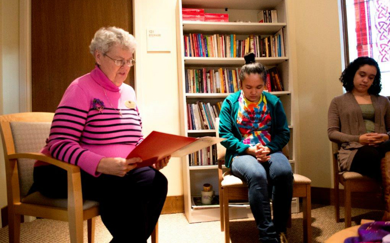 Sr. Carol Mucha, right, with students Suzie Marevka and Genesis Fisher-Garcia. (Ellie Menke)