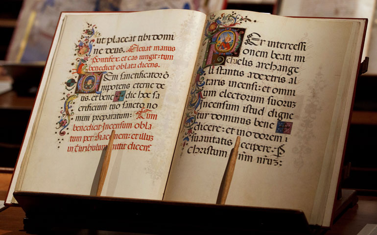 A copy of the Borgianus Latinus, a missal for Christmas made for Pope Alexander VI, is displayed in an exhibit on the Vatican Library. (CNS/Paul Haring)