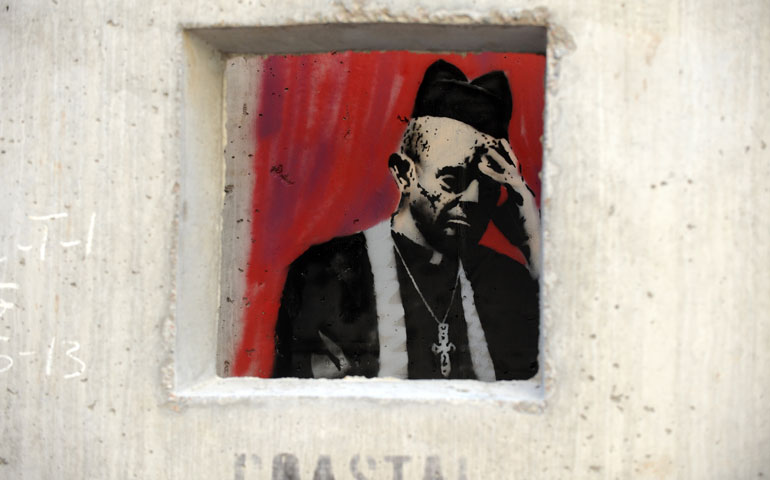 "Concrete Confessional," a work of street art by Banksy, is seen in New York in October 2013. (Newscom/ABACAUSA.COM/Dennis Van Tine)