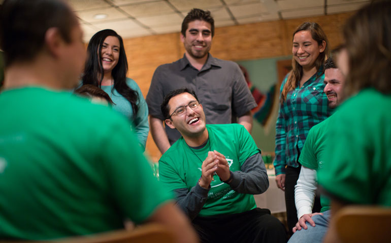Marcos Gonzalez Villalba, center, meets with young adult leaders in the diocese of Shreveport, La. Hired with the support of Catholic Extension, he is the diocese's first Hispanic youth and young adult coordinator. (Photos by CNS/Catholic Extension)