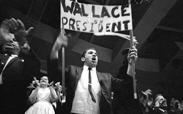 Spectators rally for Alabama Gov. George C. Wallace for president at the Mississippi Coliseum in Jackson on June 25, 1964. (Photo by Joel Katz)