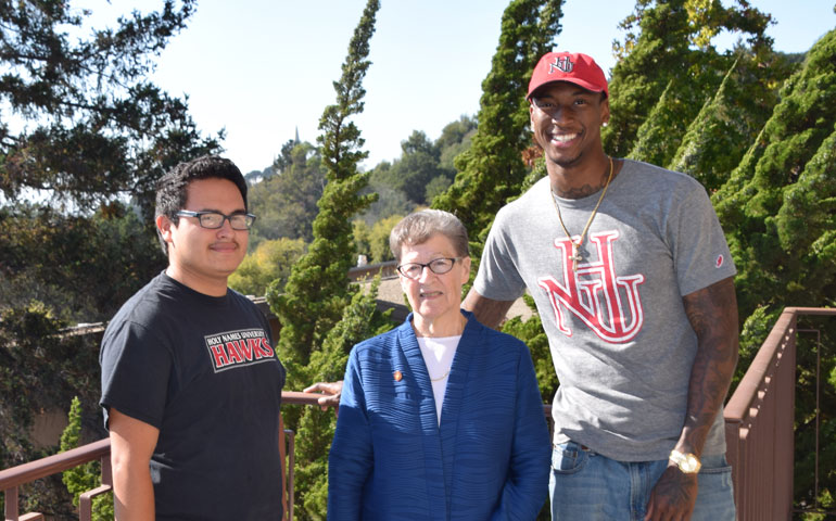 From left, Freddy Castillo, Holy Names Sr. Carol Sellman and Will Newsome on the campus of Holy Names University (Holy Names University/Kevin Hyde)