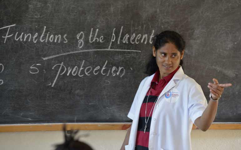 Sister Sneha Joseph, a member of the Missionary Sisters Servants of the Holy Spirit, teaches a class in late September at the Catholic Health Training Institute in Wau, South Sudan. The institute trains nurses and midwives in the newly independent countr y. (CNS photo/Paul Jeffrey) 