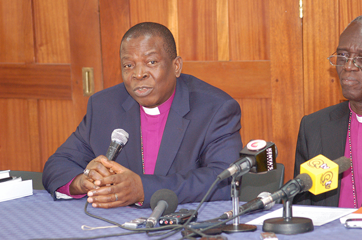 Archbishop Nicholas Okoh, left, of Nigeria and Archbishop Eliud Wabukala of Kenya speak at a recent news conference in Nairobi. The two provinces are boycotting the meeting in Lusaka, Zambia. (RNS/Fredrick Nzwili)