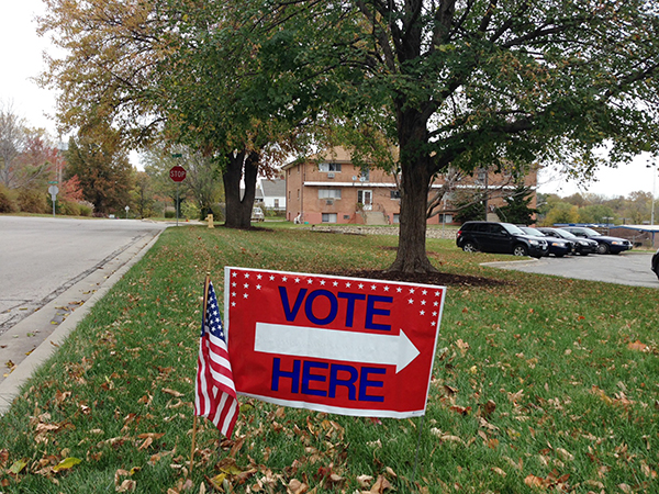 A “Vote Here” sign on display in front of Westwood City Hall on Nov. 4, 2014, in Westwood, Kan. (RNS/Sally Morrow)