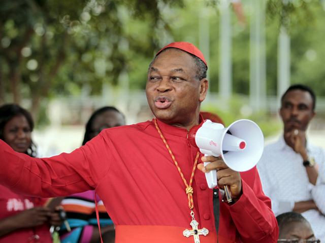 The Catholic archbishop of Abuja, John Onaiyekan, addresses Bring Back Our Girls campaigners during a protest procession marking the 500th day since the abduction of girls in Chibok, along a road in Abuja on Aug. 27, 2015. (Reuters/Afolabi Sotunde)