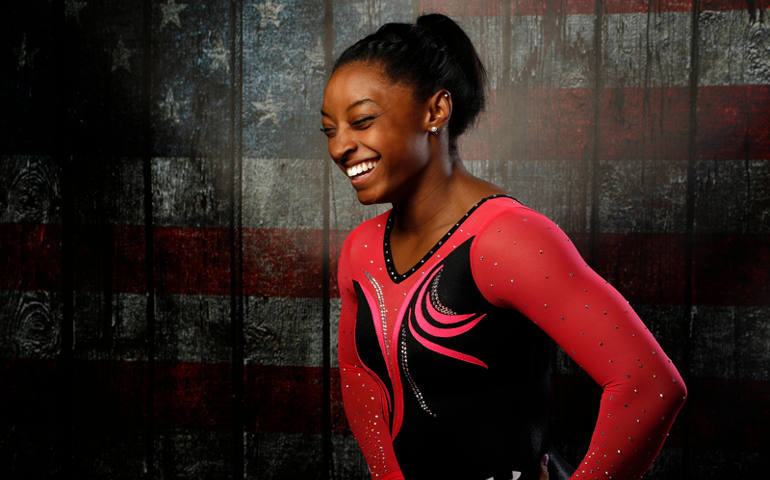 Gymnast Simone Biles laughs as she poses for a portrait at the U.S. Olympic Committee media summit in Beverly Hills, Calif., on March 7, 2016. (Photo courtesy of REUTERS/Lucy Nicholson)