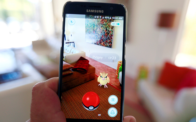 The augmented reality mobile game "Pokemon Go" by Nintendo is shown on a smartphone screen in this photo illustration taken in Palm Springs, California on July 11, 2016. (Reuters/Sam Mircovich/Illustration)