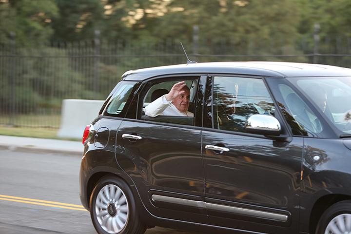 Pope Francis passes by in a black Fiat in Washington, D.C., on Sept. 23, 2015. (George Martell/Archdiocese of Boston)