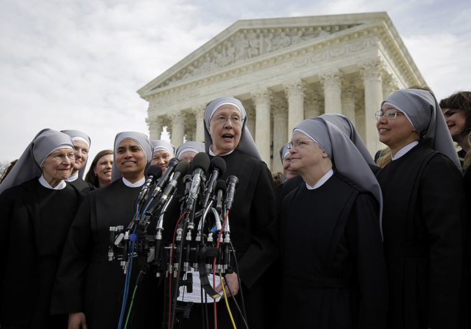 Sr. Loraine McGuire with Little Sisters of the Poor speaks to the media after Zubik v. Burwell, an appeal brought by Christian groups demanding full exemption from the requirement to provide insurance covering contraception under the Affordable Care Act, was heard by the U.S. Supreme Court in Washington on March 23, 2016. (Reuters/Joshua Roberts)
