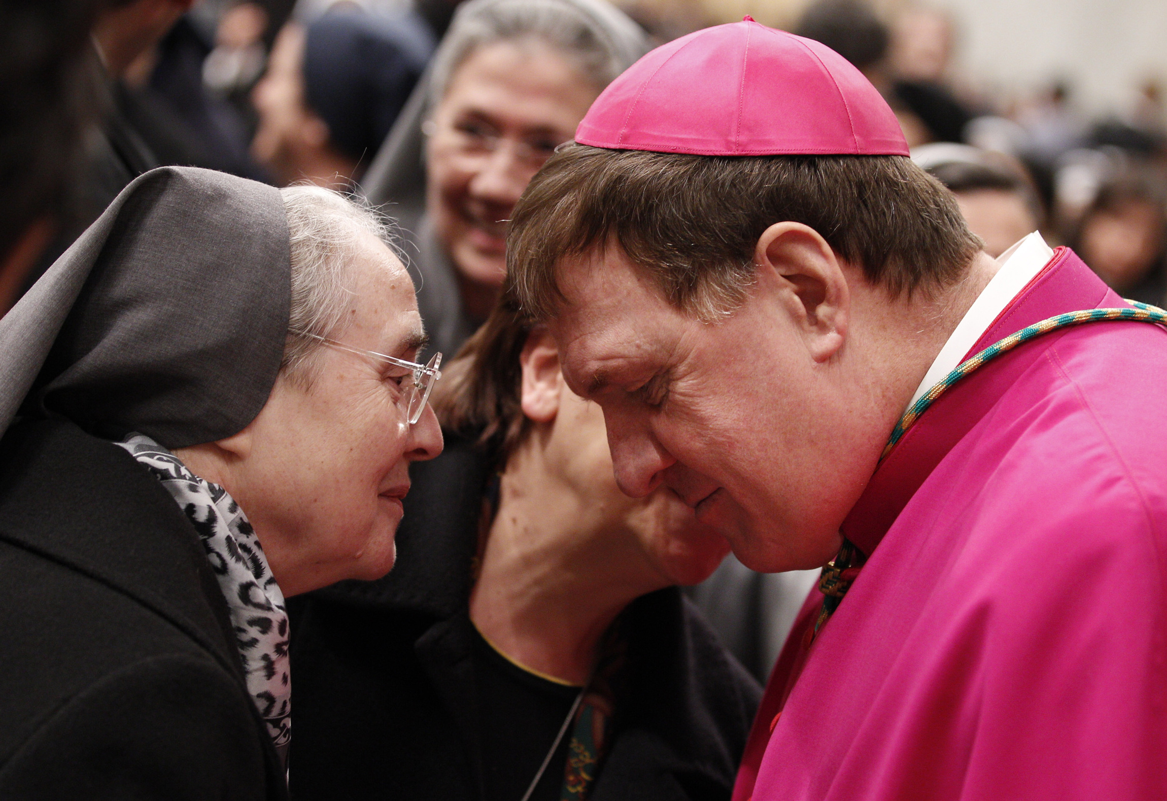 Archbishop Joseph W. Tobin talks with religious women after a vespers service at the Vatican in this Feb. 2 file photo. (CNS photo/Paul Haring)