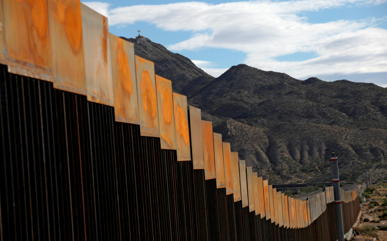 A photo taken in 2016 shows a newly built section of the U.S.-Mexico border wall at Sunland Park, N.M., opposite the Mexican border city of Ciudad Juarez, Mexico. (CNS photo/Jose Luis Gonzalez, Reuters)