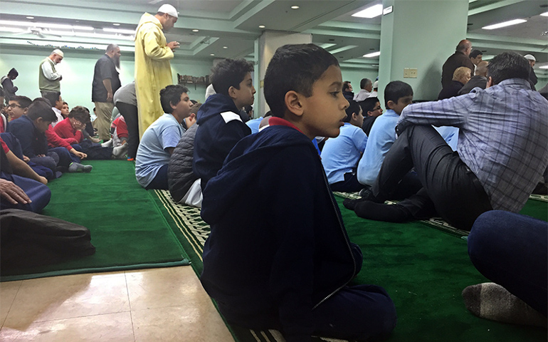 Males take part in noontime prayers at the Islamic Association of Raleigh on Nov. 11 in Raleigh, N.C. (RNS photo by Yonat Shimron)