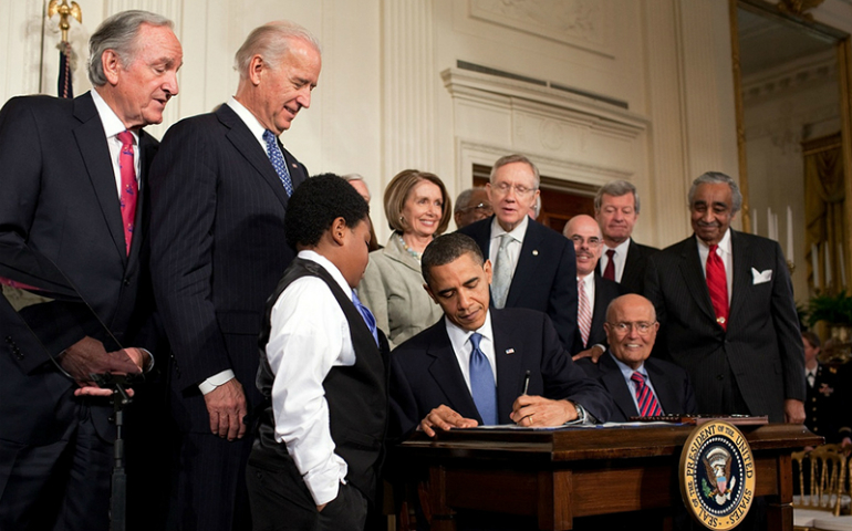 President Obama signs the Patient Protection and Affordable Care Act at the White House on March 23, 2010. (The White House/Pete Souza)