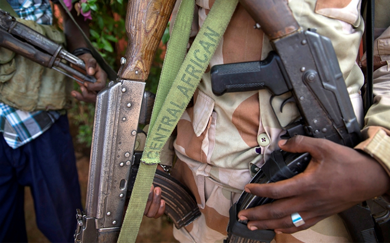 Armed militia fighters display weapons in the town of Koui, Central African Republic, on April 27, 2017. (Courtesy of Reuters/Baz Ratner)