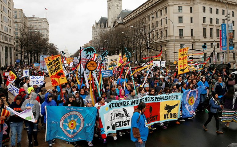Indigenous leaders participate in a protest march and rally in opposition to the Dakota Access and Keystone XL pipelines in Washington, D.C., on March 10, 2017. (Reuters/Kevin Lamarque)