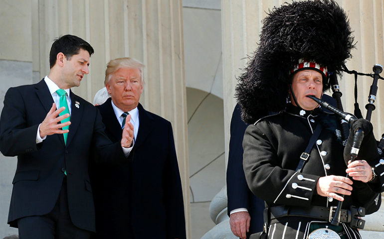 Speaker of the House Paul Ryan, left, and U.S. President Donald Trump follow a piper down the steps after they attended the annual Friends of Ireland St. Patrick’s Day lunch at the U.S. Capitol in Washington, D.C., March 16. (Reuters/Kevin Lamarque)