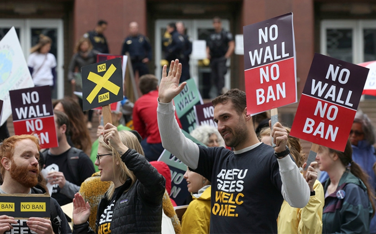 People protest President Trump's second travel ban outside of the U.S. Court of Appeals in Seattle on May 15, 2017. (Reuters/David Ryder)