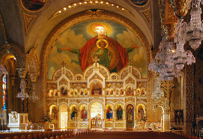 Above every Greek Orthodox church’s altar, Theotokos, or Mary the Mother of Jesus, symbolically watches over the congregation. The figure, with arms outstretched, welcomes visitors and parishioners alike at St. Sophia Greek Orthodox Cathedral near downtown Los Angeles. (Photo courtesy of Creative Commons/Floyd B. Bariscale)