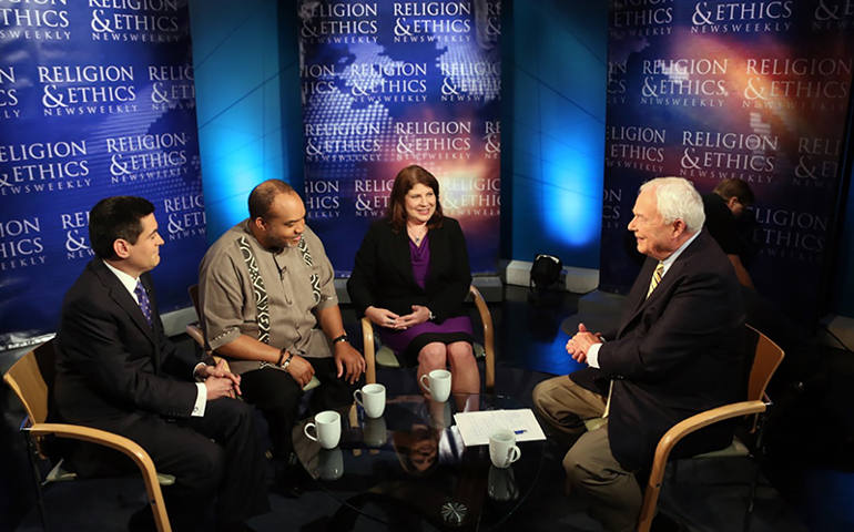 On the "Religion & Ethics NewsWeekly" set with Russell Moore of the Southern Baptist Convention, from left, Alton Pollard III, dean of Howard University School of Divinity; Kim Lawton, the show's managing editor; and Bob Abernethy, the show’s host/executive editor, in August 2014. (Photo courtesy of Religion & Ethics NewsWeekly)