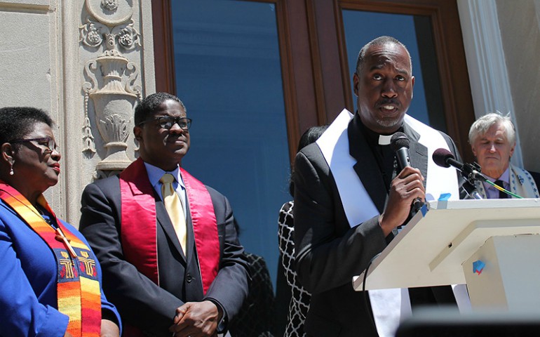 The Rev. Jimmie R. Hawkins speaks with other faith leaders at a press conference responding to the Trump administration's policies in Washington, D.C., on May 15, 2017. (Ray Chen/Office of Public Witness, PC[USA])