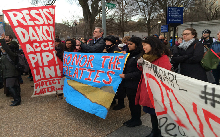 Activists who oppose the Dakota Access Pipeline protest outside the White House on Jan. 24, 2017, following President Donald Trump’s executive orders earlier in the day to continue construction. (RNS/Jerome Socolovsky)