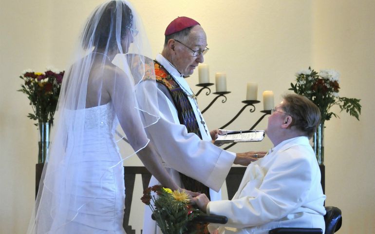 Archbishop Richard Gundrey of the Catholic Apostolic Church of Antioch officiates at a wedding of two women in Pojoaque, New Mexico, in 2013. (Newscom/ZUMA Press/Eddie Moore)