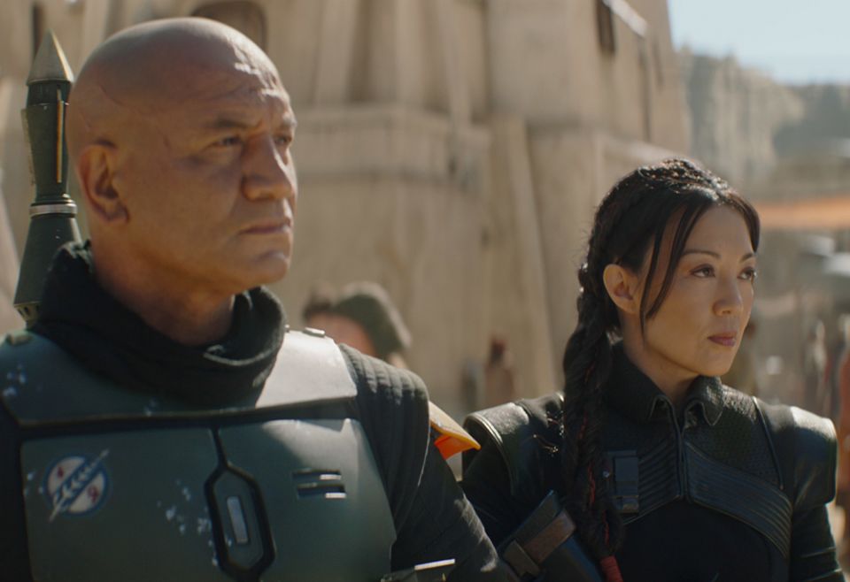 Temuera Morrison, left, is Boba Fett and Ming-Na Wen is Fennec Shand in Lucasfilm's "The Book of Boba Fett," exclusively on Disney+. (Lucasfilm Ltd.) Temuera Morrison, left, is Boba Fett and Ming-Na Wen is Fennec Shand in Lucasfilm's "The Book of Boba Fett," exclusively on Disney+. (Lucasfilm Ltd.)