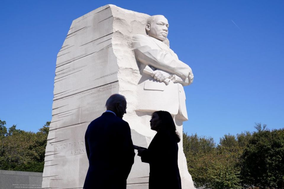 President Joe Biden and Vice President Kamala Harris stand at the Martin Luther King Jr. Memorial as they arrive to attend an event marking the 10th anniversary of the dedication of memorial in Washington Oct. 21. (AP/Susan Walsh)