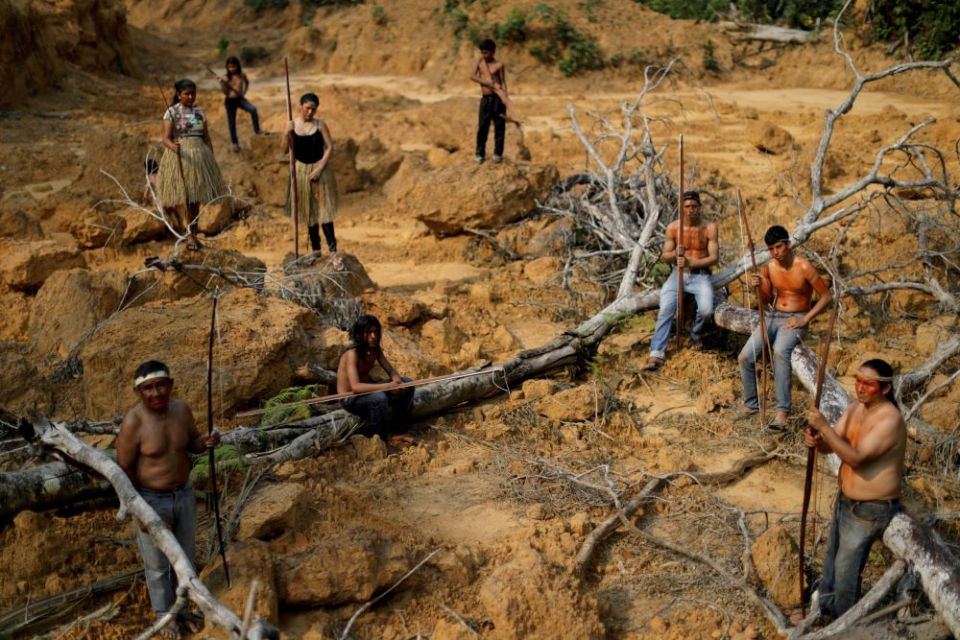 People from the Mura tribe are pictured in a file photo at a deforested area in unmarked Indigenous lands inside the Amazon rainforest near Humaita, Brazil. (CNS/Reuters/Ueslei Marcelino)