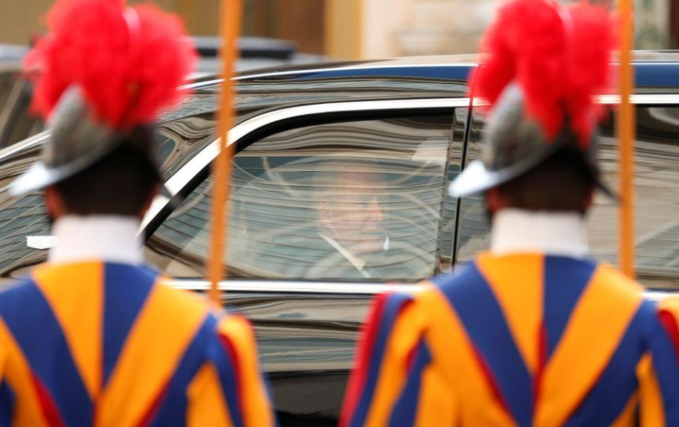 President Joe Biden looks out from the window of his limousine as he leaves the San Damaso Courtyard of the Apostolic Palace after meeting with Pope Francis at the Vatican Oct. 29, 2021. (CNS/Paul Haring)