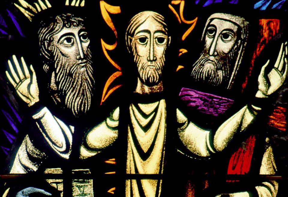 A church window depicts the Transfiguration of Christ, in which Moses and Elijah are seen with Jesus in a glorified state before the apostles Peter, James and John. (CNS/Crosiers) A church window depicts the Transfiguration of Christ, in which Moses and Elijah are seen with Jesus in a glorified state before the apostles Peter, James and John. (CNS/Crosiers)