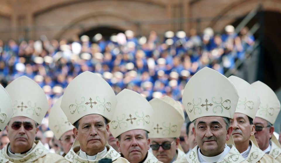 Bishops attend Mass with Pope Benedict XVI at the Basilica of the National Shrine of Our Lady Aparecida in Brazil in May 2007, as Benedict opened the Fifth General Conference of the Bishops of Latin America and the Caribbean. (CNS/Catholic Press Photo)